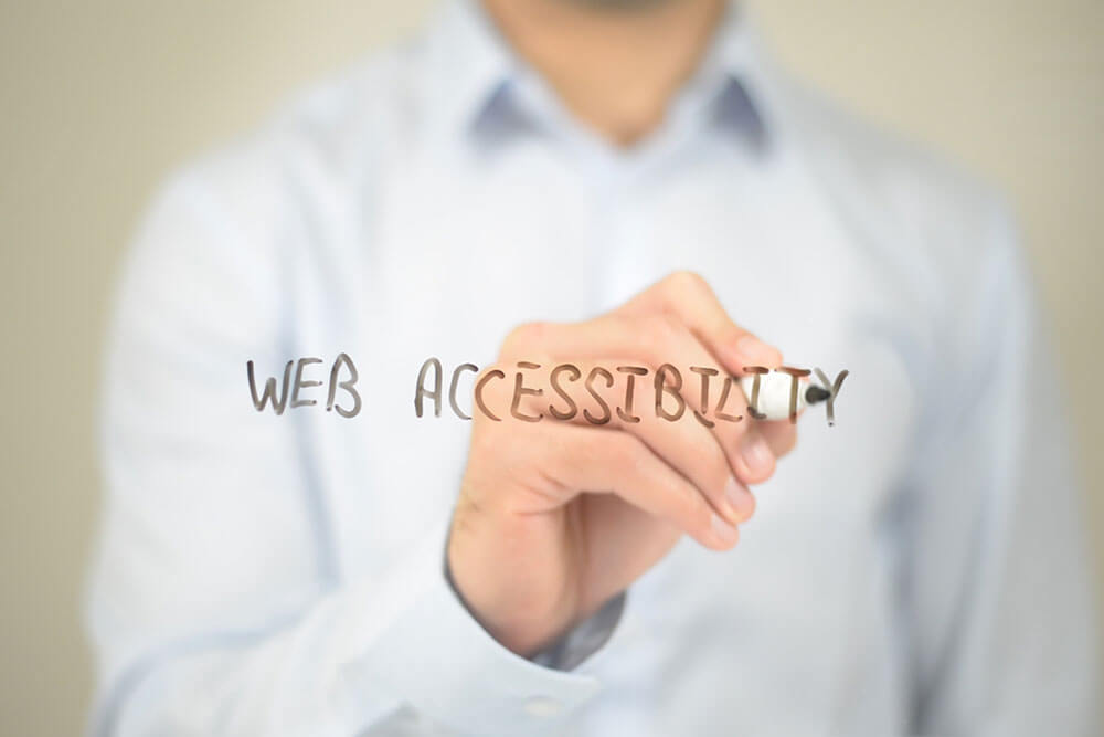 man pressing floating website accessibility audit icons